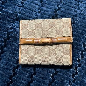 Pre-loved Gucci monogram bamboo wallet